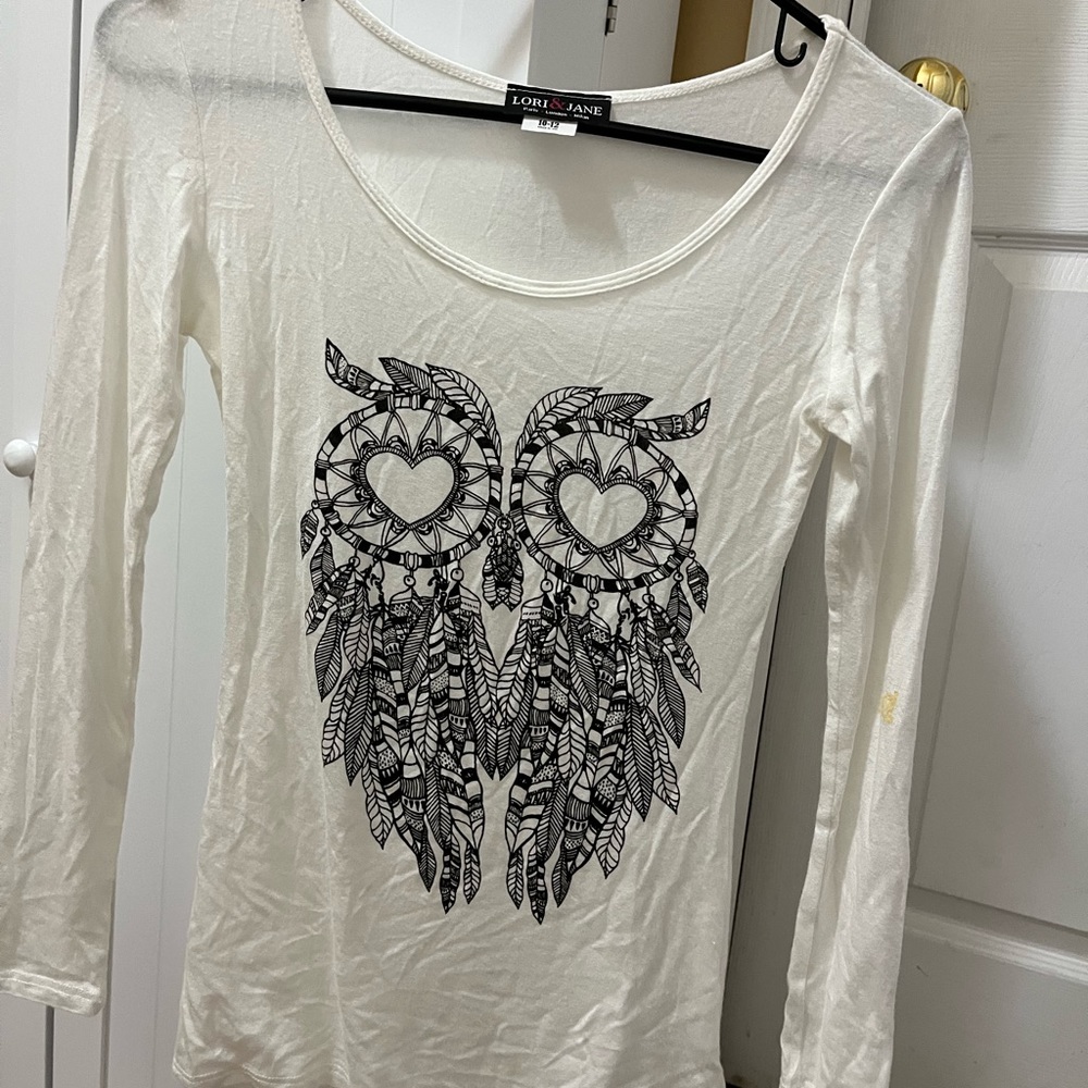 Long sleeve tee shirt. Girls size 10-12. Soft stretchy material.